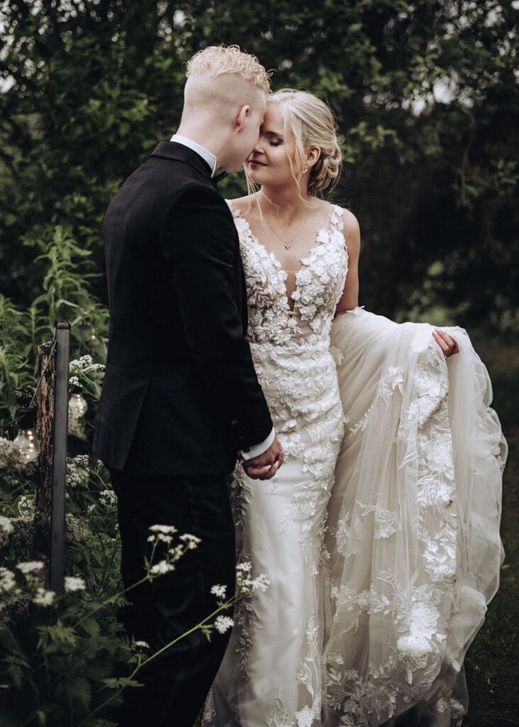 Wedding couple holding hands during their wedding day as captured by Melbourne engagement elopement and wedding photographer Miss Moody Photography